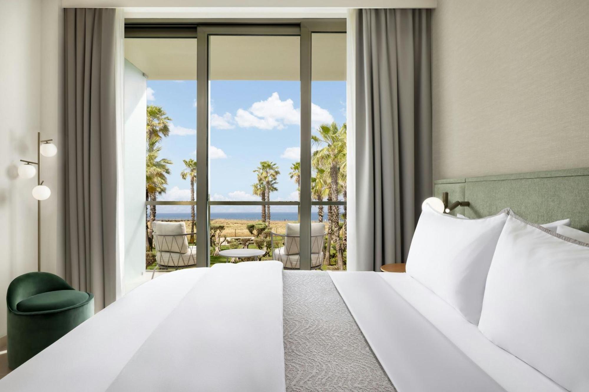 Habitación Deluxe con vistas al mar y al jardín - 1 cama extragrande